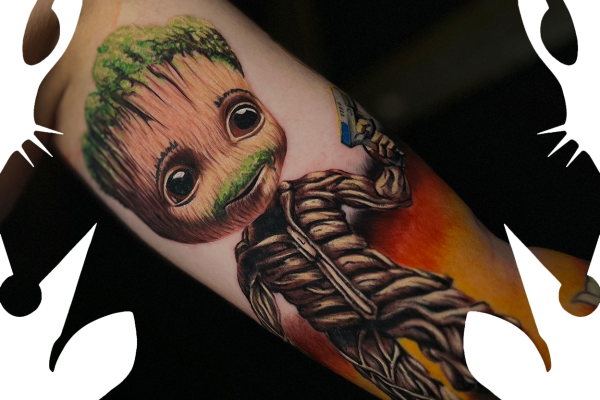 "Groot" tattoo in full color with unique mustache and hair, represent the father of the guest. Super cute tattoo idea